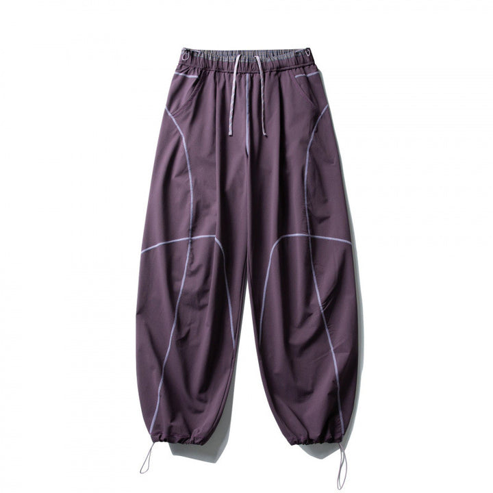 Unisex Locker geschnittene Tech-Jogginghose mit elastischem Bund, markanten Flatlock-Nähten und Kordelzug Echo Archiv
