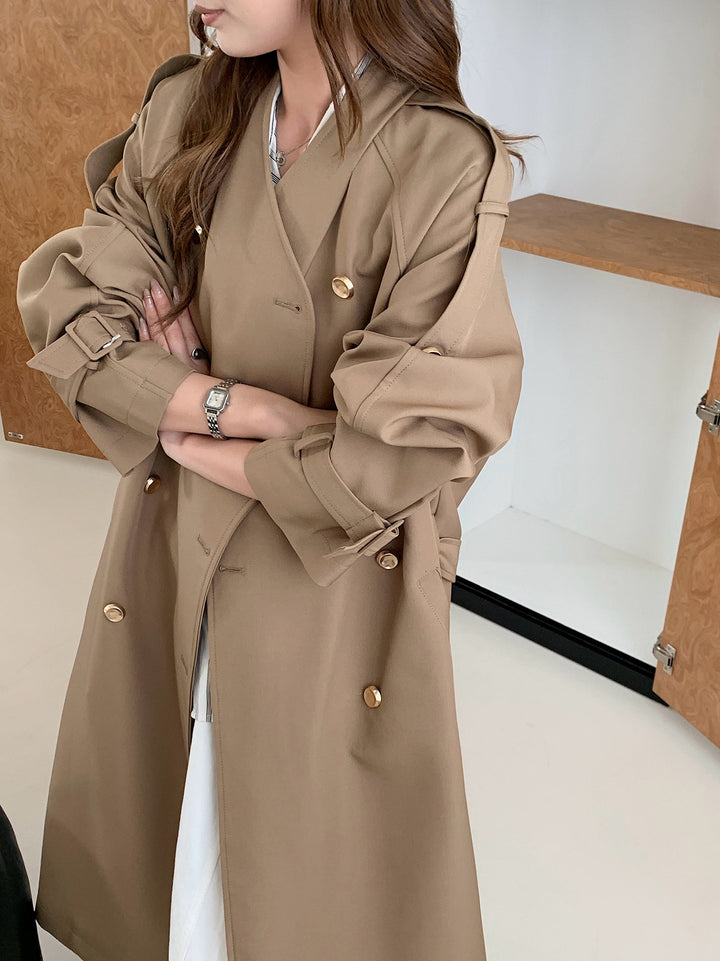 Damen Lang geschnittener Trenchcoat mit doppelreihiger Knopfleiste und verstellbaren Ärmelriegeln Echoarchiv