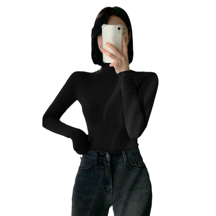 Damen Enganliegendes Rollkragen-Longsleeve aus Rippstrick mit Daumenloch – Avérine