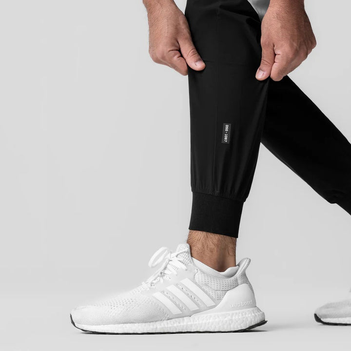 Herren Athletische Trainingshose mit seitlichen Kontrastpanelen Echoarchiv