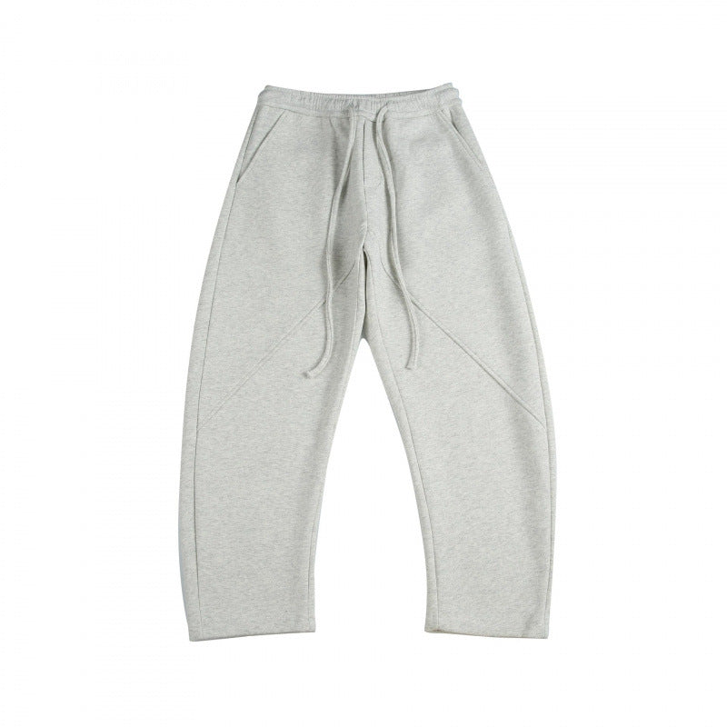 Unisex Weite Tech-Jogginghose mit diagonalem Nahtdesign, Elastikbund und Tunnelzug Echo Archiv