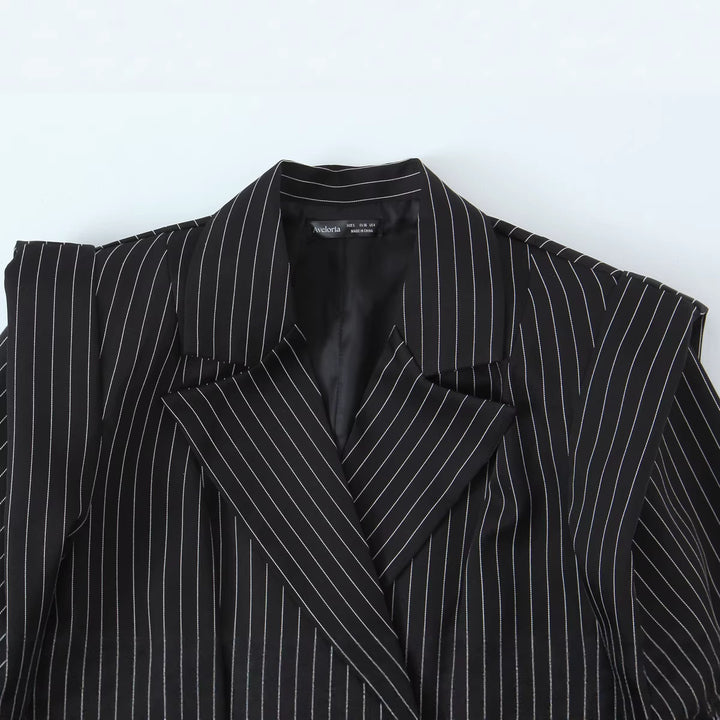Damen Zweireihiger Oversize-Blazer mit markanten Schulterpolstern und Nadelstreifen Echo Archiv