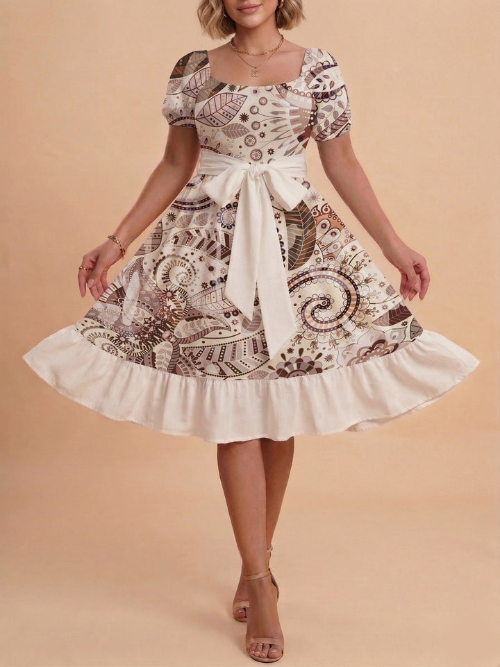 Damen modernes Blumenkleid mit elegantem Taillengürtel und asymmetrischem Saum Echo Archiv