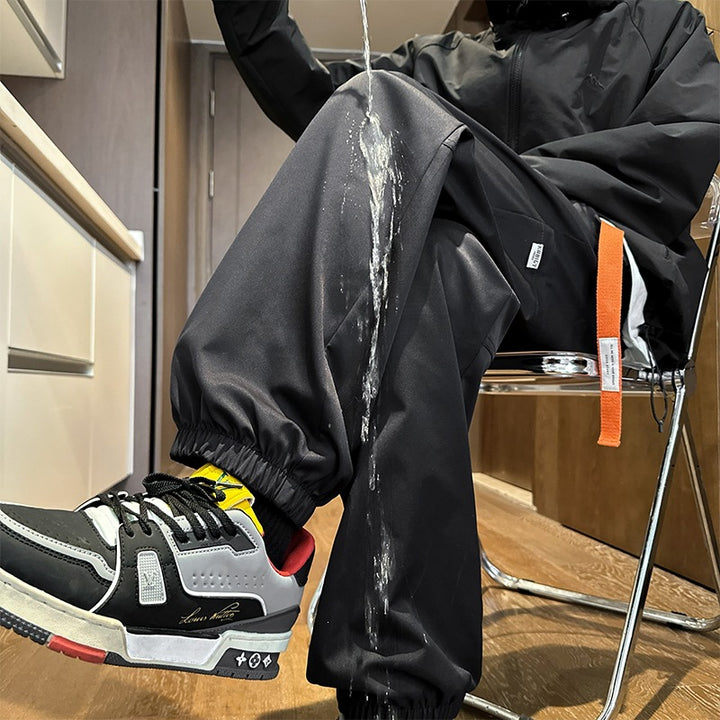 Herren Wasserabweisende Tech-Jogginghose mit elastischem Saum, Kordelzug und robusten Nähten Echo Archiv