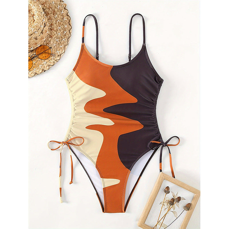 Damen Einteiler Badeanzug mit asymmetrischem Muster und verstellbarem Bindeband Echo Archiv