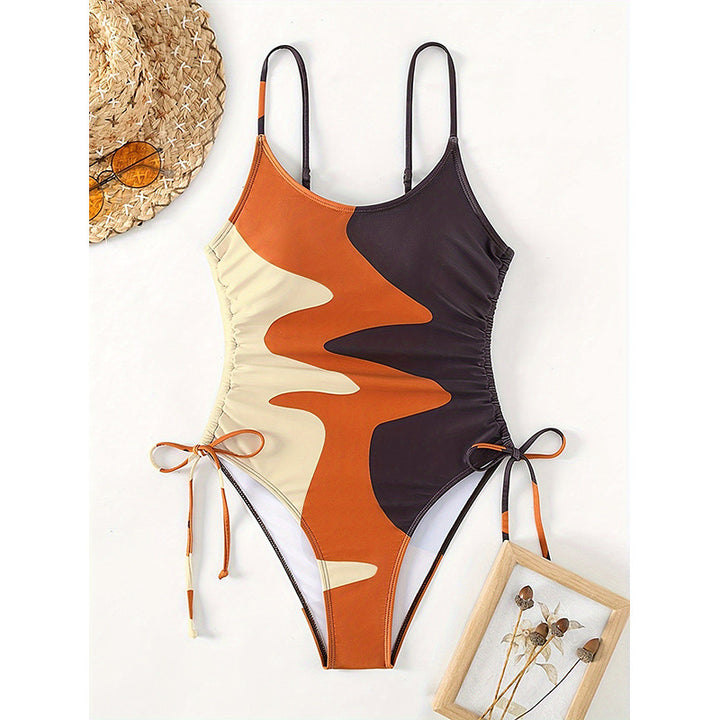Damen Einteiler Badeanzug mit asymmetrischem Muster und verstellbarem Bindeband Echo Archiv