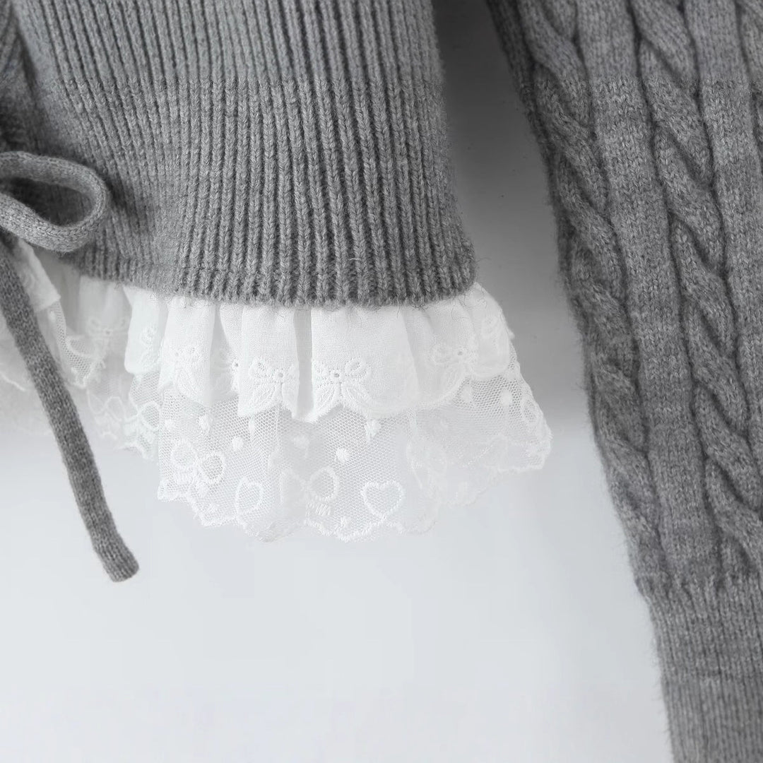 Damen Strickjacke mit Zopfmuster, Knopfleiste und Spitzenvolant Echo Archiv