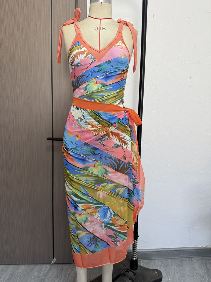 Damen Einteiler Badeanzug mit verspielten Bindebändern und elegantem Wickelrock Echo Archiv