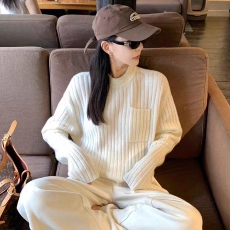 Damen Oversize-Rippenstrickpullover mit Brusttasche und Mockneck Echoarchiv