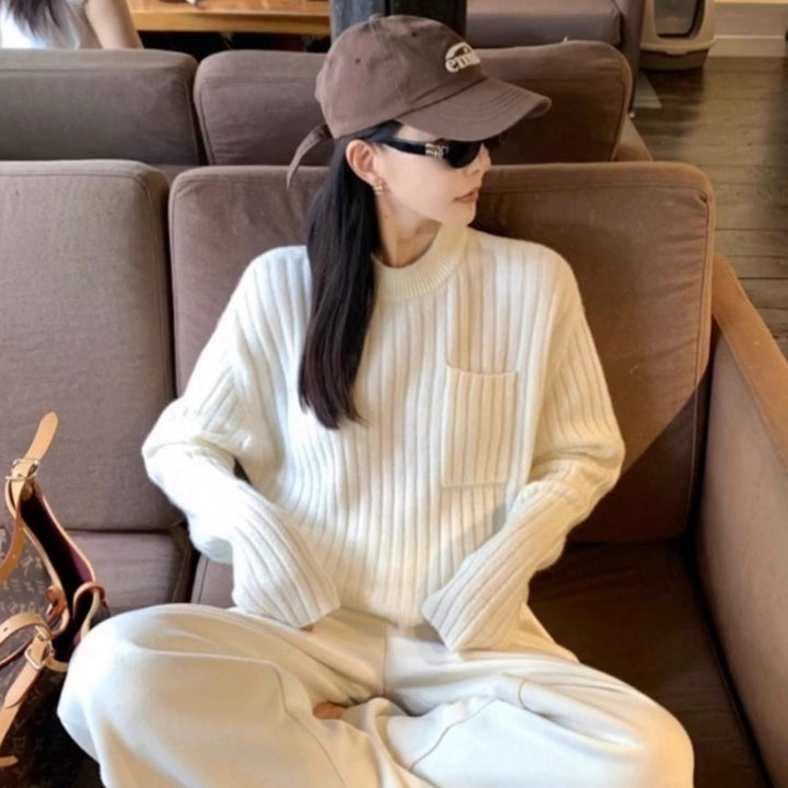 Damen Oversize-Rippenstrickpullover mit Brusttasche und Mockneck Echoarchiv