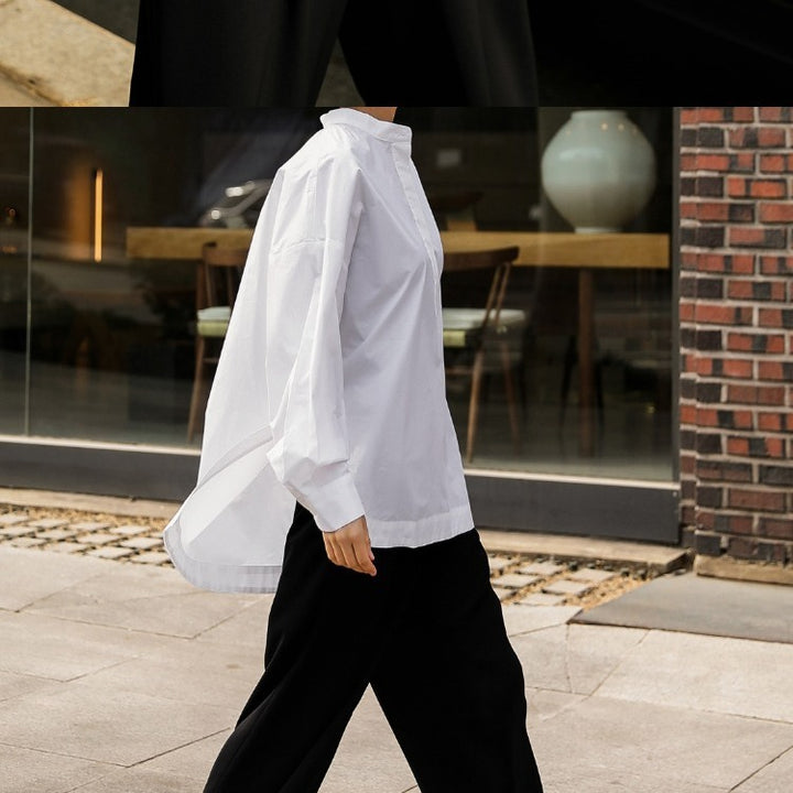 Damen Boxy-Baumwollbluse mit breitem Kentkragen und legerer Passform Echoarchiv