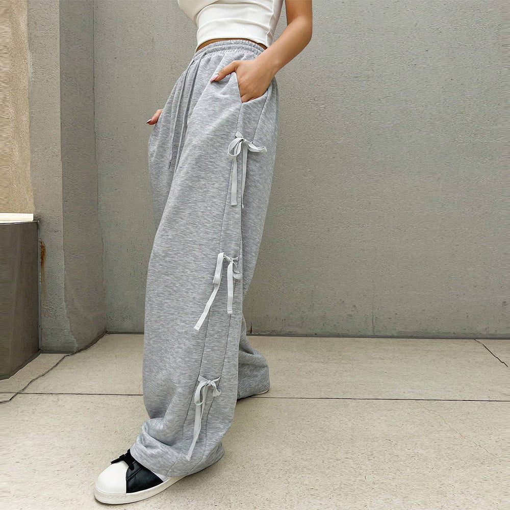 Damen lockere Wide‑Leg Loungehose mit elastischem Bund, Kordelzug und seitlichen Zierschleifen – Avélisse