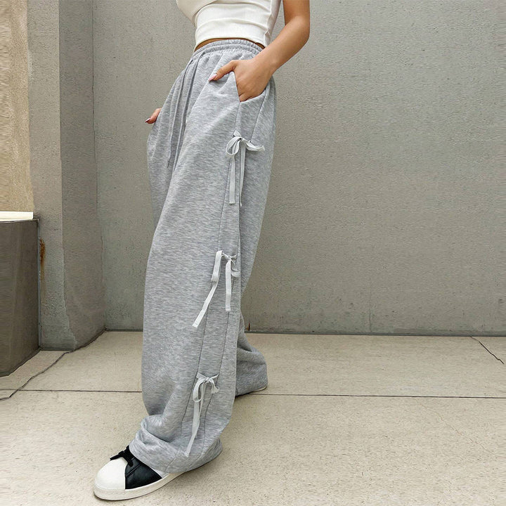 Damen lockere Wide‑Leg Loungehose mit elastischem Bund, Kordelzug und seitlichen Zierschleifen – Avélisse