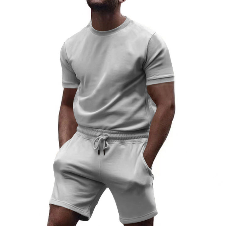 Herren nan minimalistisches Jersey-Ensemble mit bequemem Rundhalsshirt und elastischer Tunnelzug-Kurzhose Echo Archiv