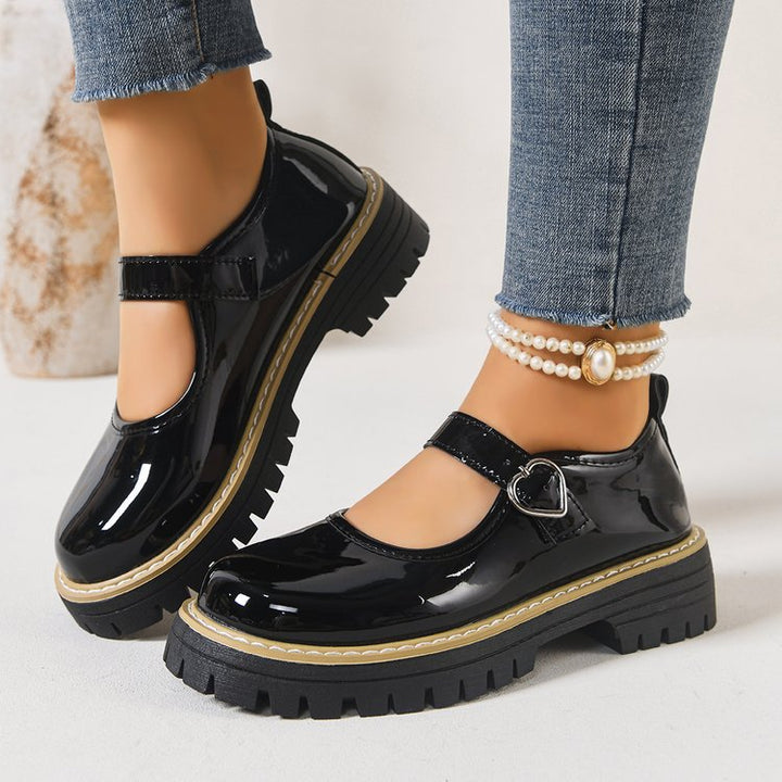 Damen Riemchen‑Slipper im Mary‑Jane‑Stil mit grober Profilsohle und Herzschließe Echo Archiv