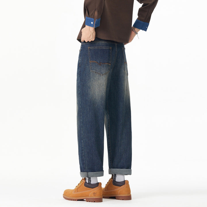 Herren Weite gerade geschnittene Denim-Jeans mit Used‑Wash und Umschlagbund Echoarchiv