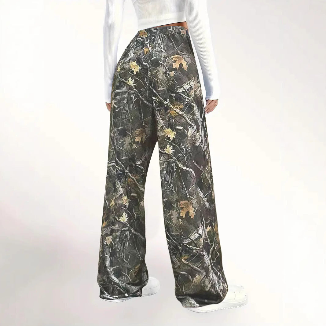 Damen Weite Palazzo-Loungehose im Camouflage-Blattmuster mit Elastikbund, Tunnelzug und Eingrifftaschen Echoarchiv