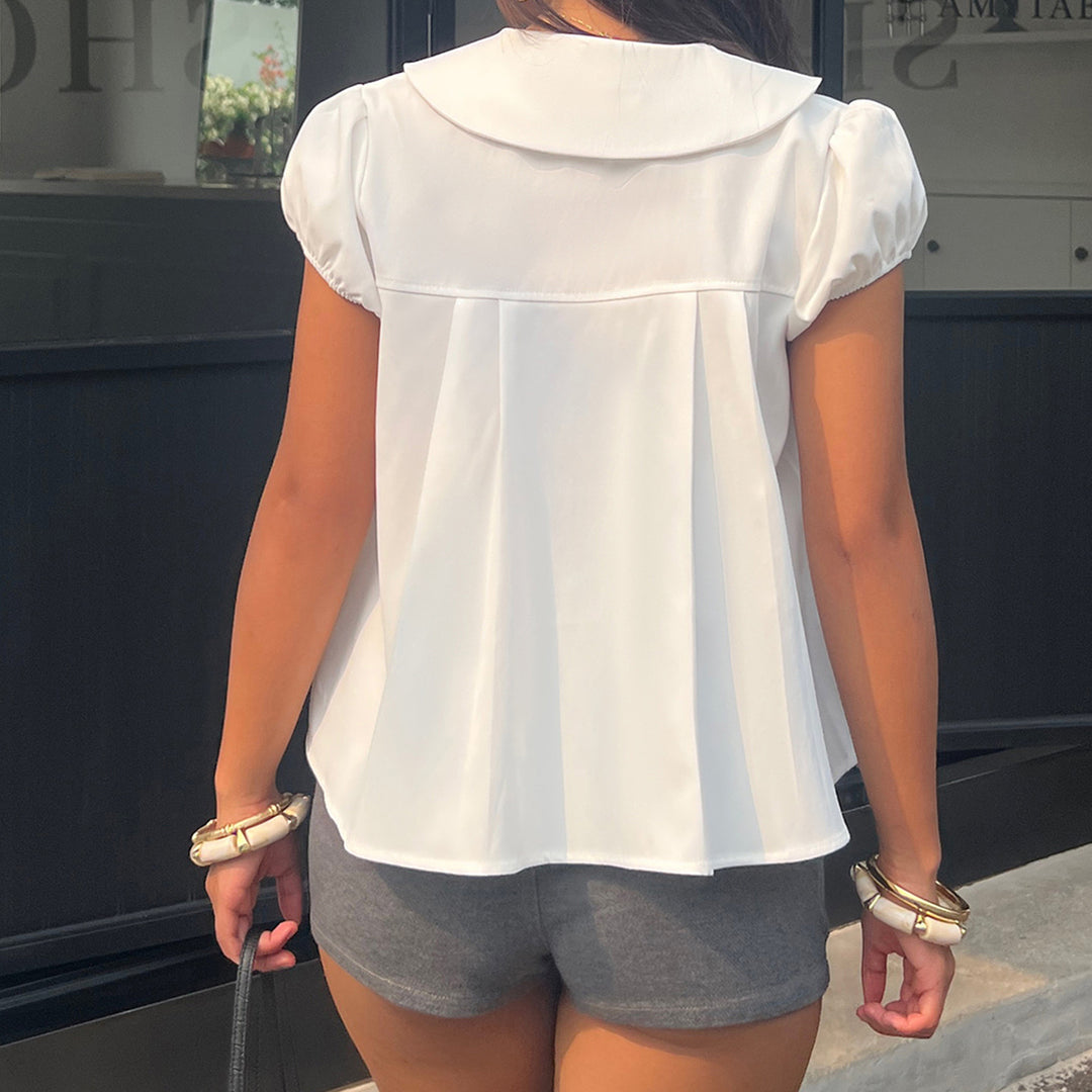 Damen Bluse mit raffinierter Knopfleiste und verspielten Puffärmeln Echo Archiv