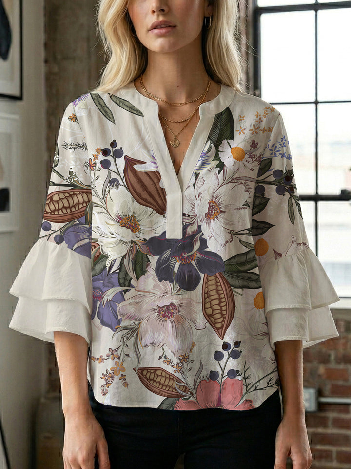 Damen Elegantes Oberteil mit voluminösen Rüchenärmeln und floralem Druck Echo Archiv