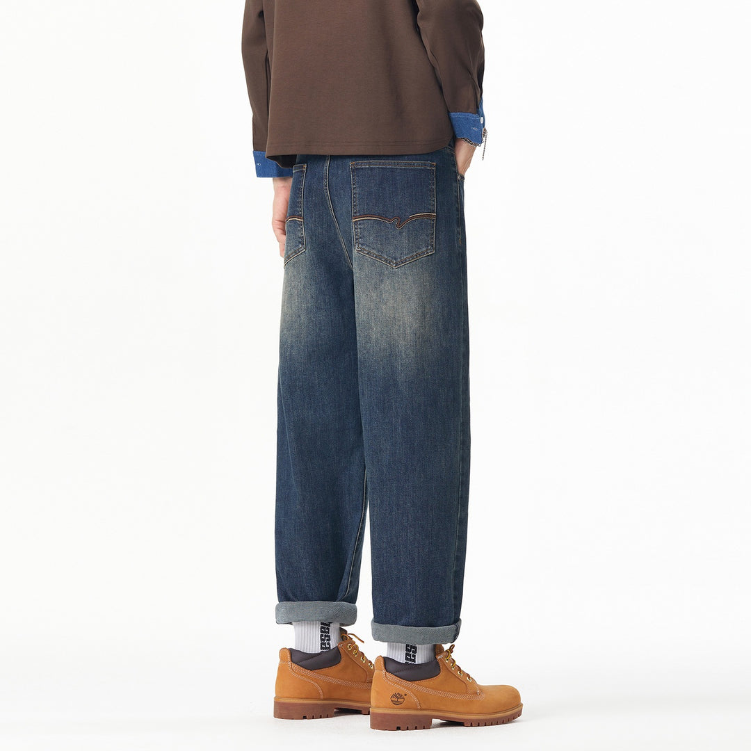 Herren Weite gerade geschnittene Denim-Jeans mit Used‑Wash und Umschlagbund Echoarchiv