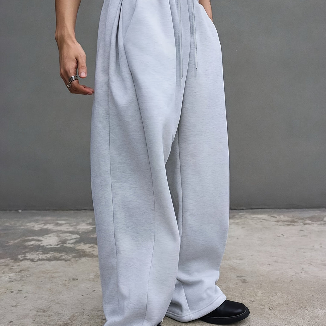 Herren Weite Baggy-Jogginghose mit elastischem Bund, Tunnelzug & extra langem Bein Echoarchiv