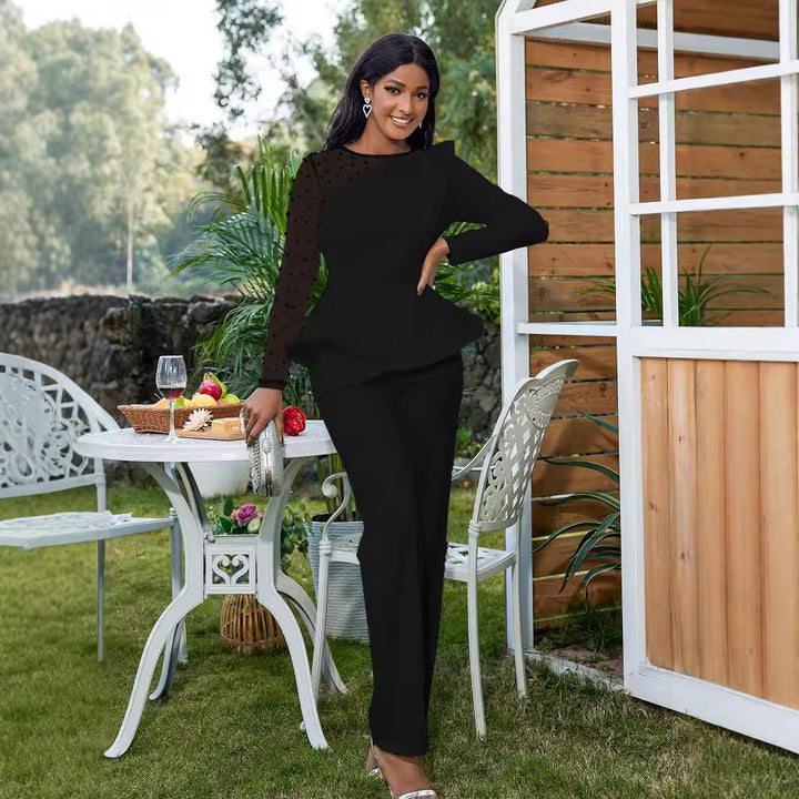 Damen Eleganter Jumpsuit mit transparenten Puffärmeln und tiefem V-Ausschnitt Echo Archiv