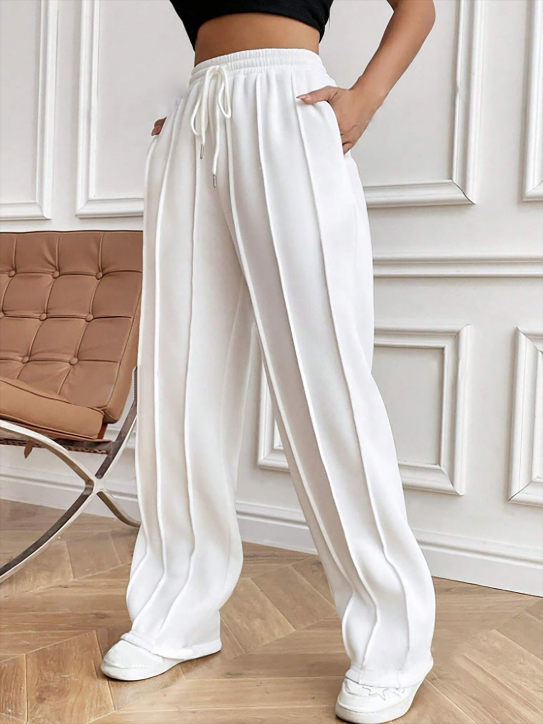 Damen Weite High-Waist Plissee-Hose mit Tunnelzug und markanter Bügelfalte Echoarchiv
