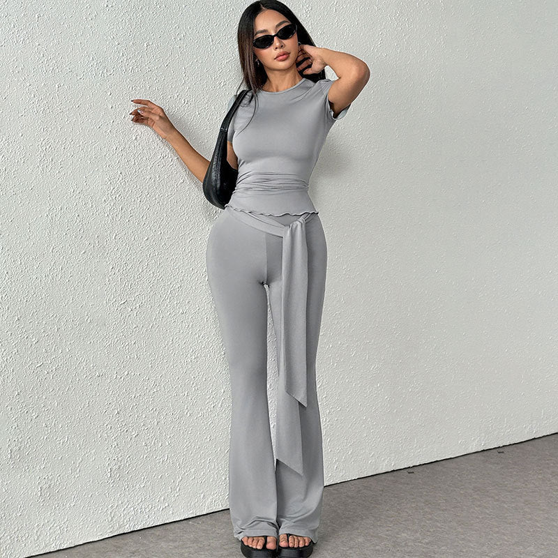 Damen elegantes Set aus figurbetontem Oberteil und ausgestellten Hosen Echo Archiv