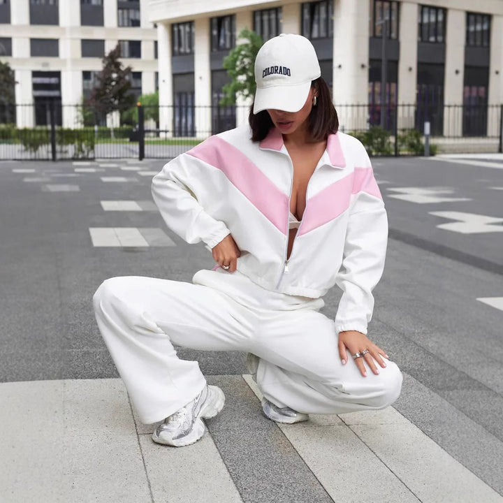 Damen cropped Zipjacke und weite Trackpants mit kontrastierendem Seitenstreifen – Avérine