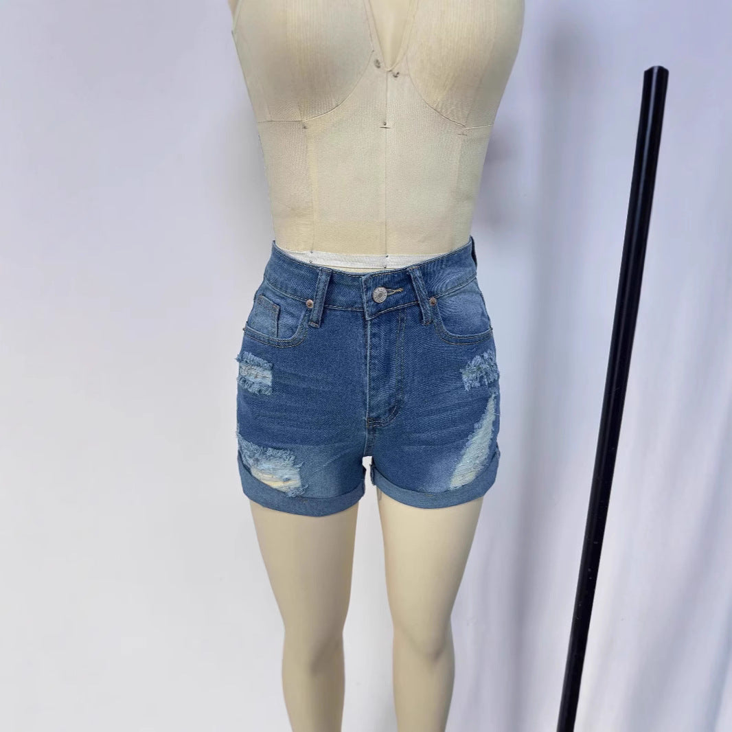 Damen kurze Destroyed Denim-Shorts im lässigen Look mit umgeschlagenen Säumen und stylischen Rissdetails Echo Archiv