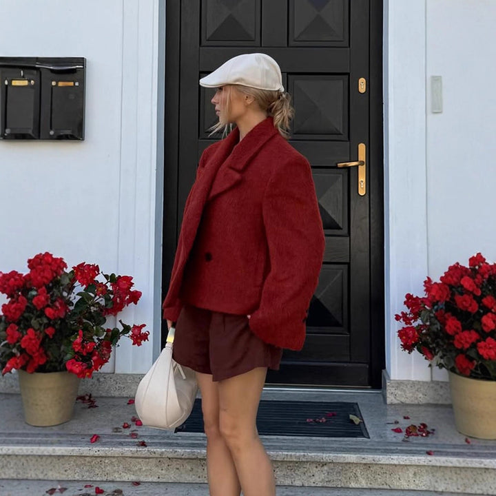 Damen Kurzboxy Kunstpelz‑Jacke mit breitem Revers und strukturierter Felloptik Echoarchiv