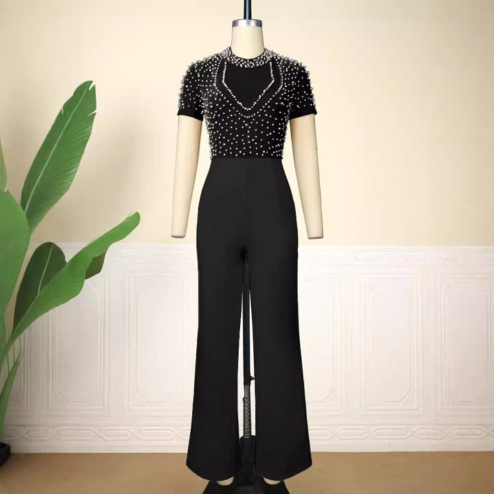 Damen eleganter Jumpsuit mit glitzernden Perlenakzenten Echo Archiv