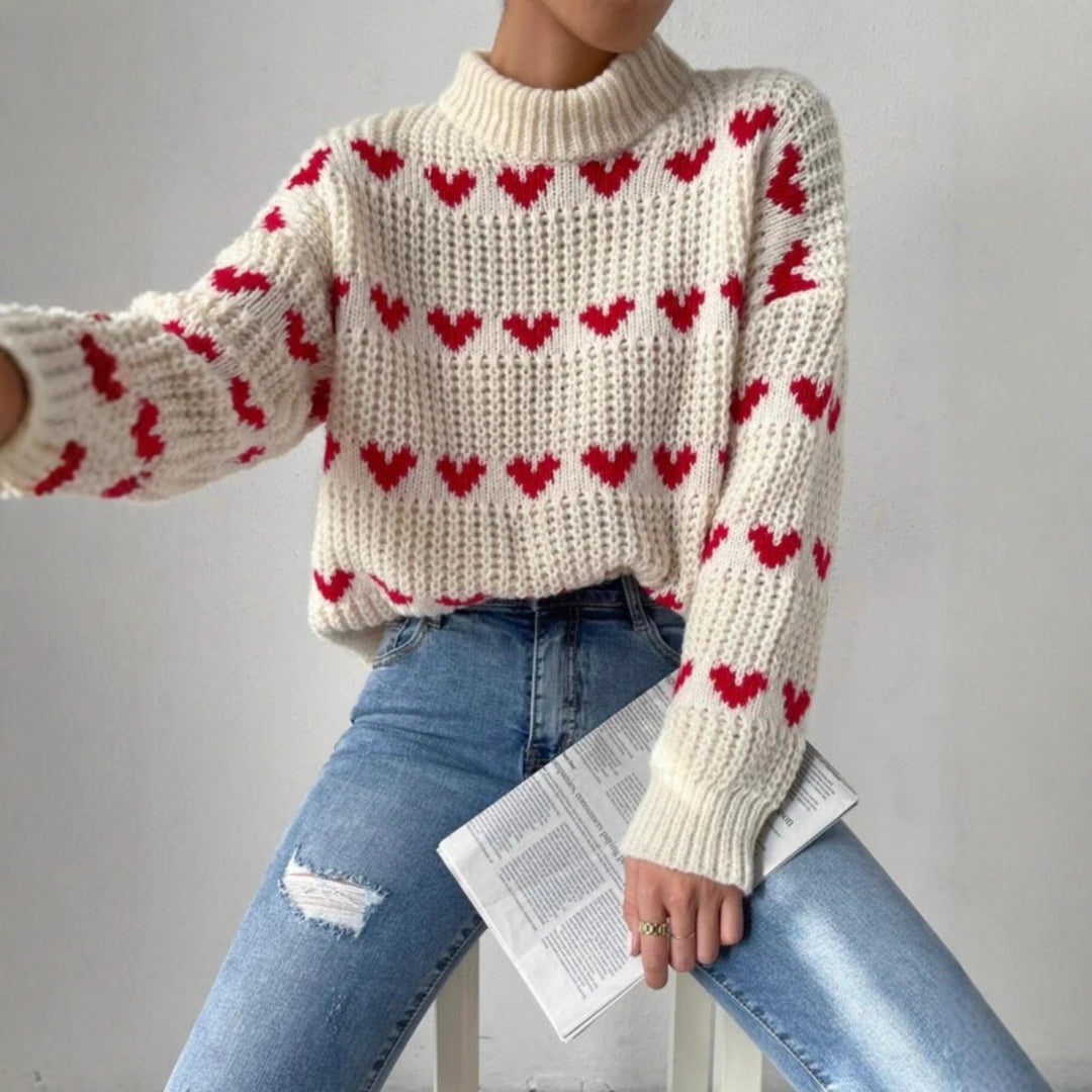 Damen nan Grobstrickpullover mit eingestrickten Herzmotiven, hohem Stehkragen und lässiger Oversize-Silhouette Echo Archiv