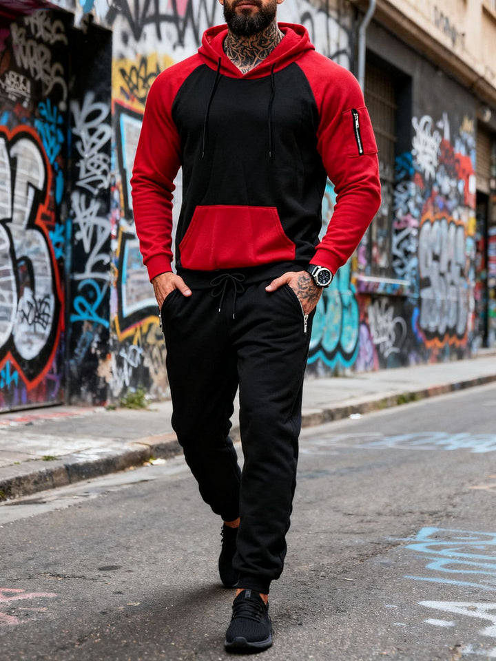 Herren nan zweiteiliges Kapuzen-Sweatset mit Raglanärmeln, Ärmel-Zip-Tasche und tapered Jogginghose Echo Archiv