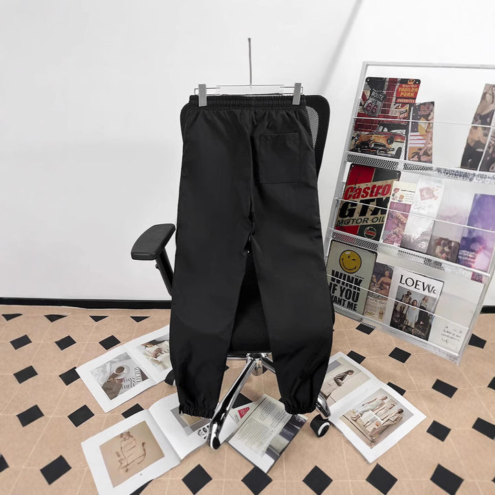 Unisex Sportliche Jogginghose mit verstellbarem Bund und Seitentaschen Echoarchiv