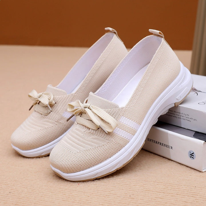 Damen Schlupf-Strick-Sneaker mit dekorativer Schleife und gedämpfter Plateausohle – Névara