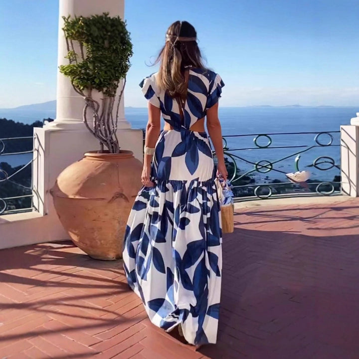 Damen Maxi-Kleid mit raffinierten Cut-Out-Details und voluminösen Rüschen Echo Archiv