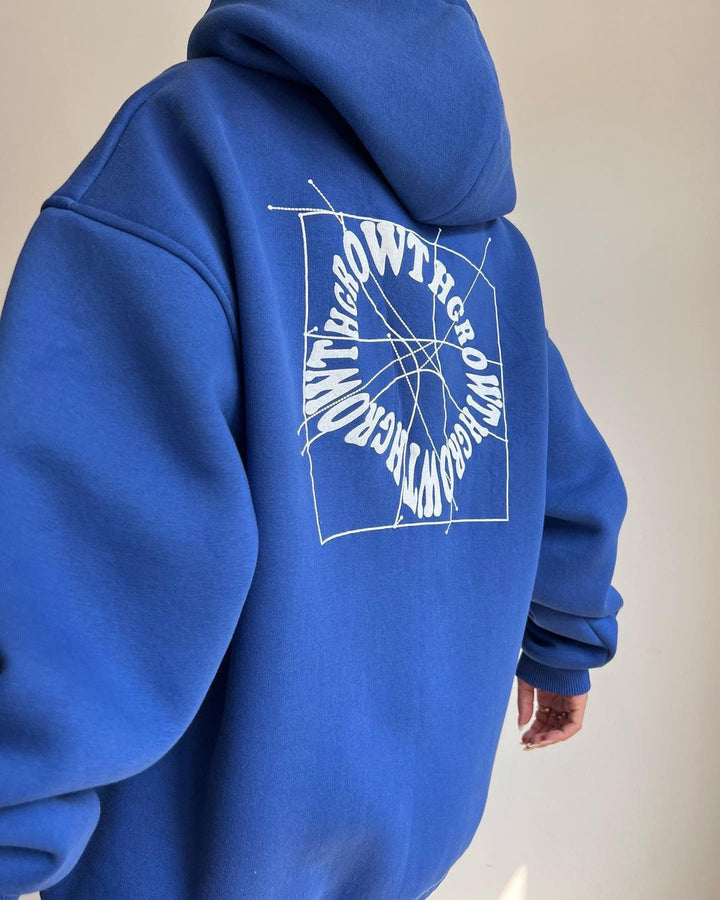 Damen Oversized Kapuzenpullover mit abstraktem Rückenprint und gerippten Bündchen Echoarchiv
