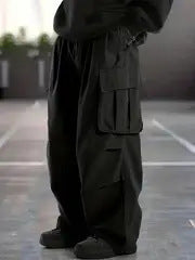 Herren Oversize-Baggy-Cargohose im Urban-Utility-Stil mit elastischem Tunnelzugbund und Mehrfachklappentaschen Echo Archiv