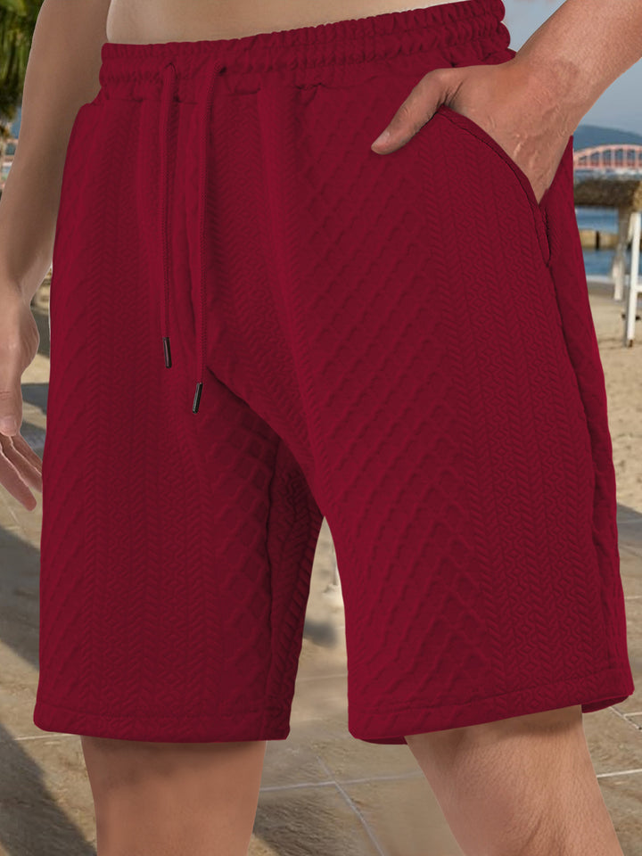 Herren nan strukturierte Strand-Bermuda aus Waffeljersey mit elastischem Kordelbund und schrägen Eingrifftaschen Echo Archiv