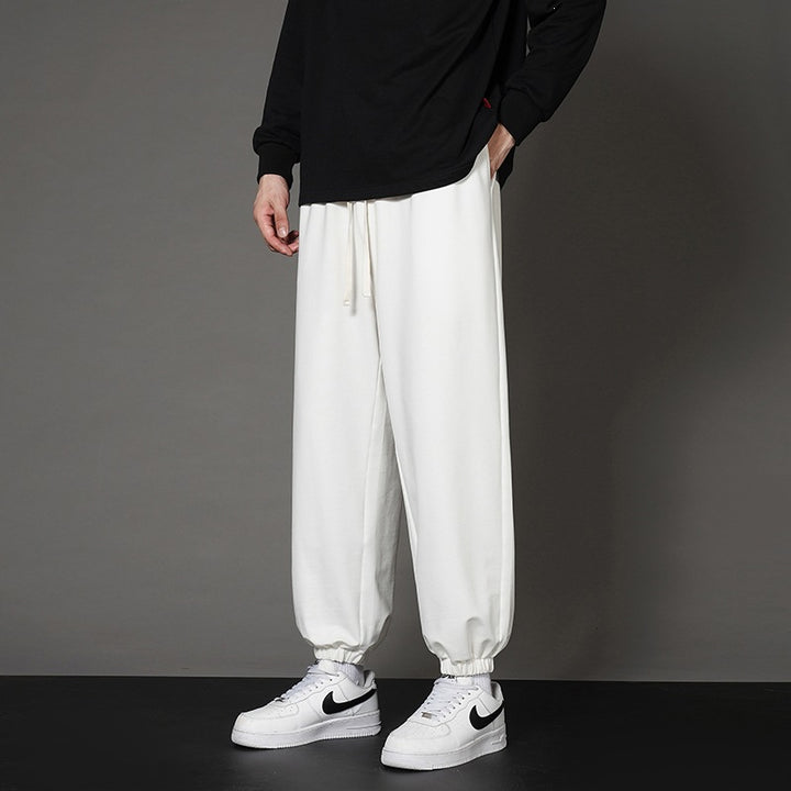 Herren Weite Relax-Jogginghose mit Kordelbund, geradem Beinverlauf & elastischen Bündchen Echoarchiv