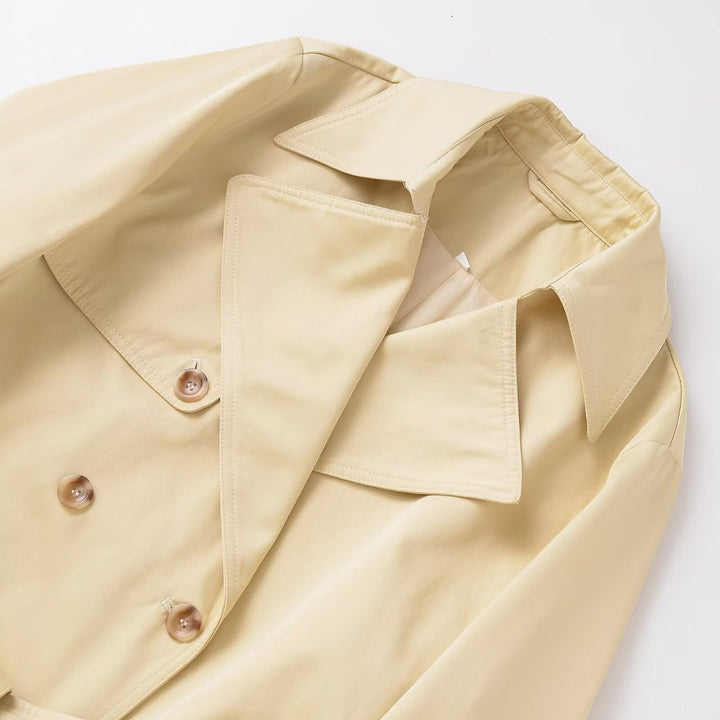 Damen Midi-Trenchcoat aus leichtem Funktionsstoff mit Bindegürtel und Sturmklappe Echoarchiv