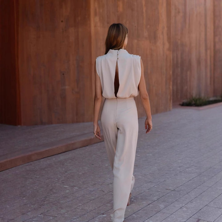 Damen Eleganter Jumpsuit mit hochgeschlossenem Kragen und weiten Beinen Echo Archiv