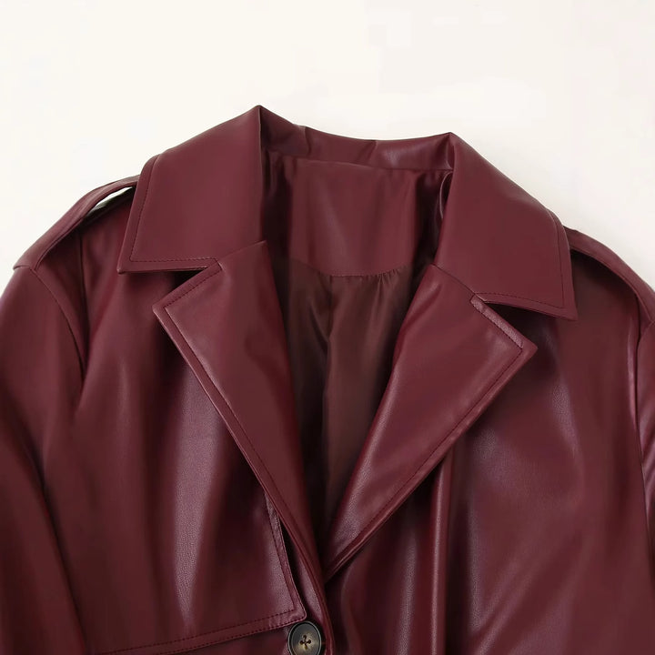 Damen nan langer veganer Trenchcoat in Lederoptik mit Taillengürtel und Schulterklappe Echo Archiv
