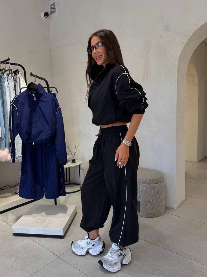 Damen Kurzgeschnittenes Windbreaker-Set mit weiter Trackhose und Kontrastpaspel Echoarchiv