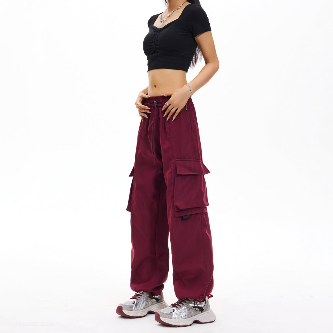 Herren weite Utility‑Cargohose im Baggy‑Cut mit Tunnelzugbund, großen Klappentaschen und verstellbarem Beinabschluss Echo Archiv