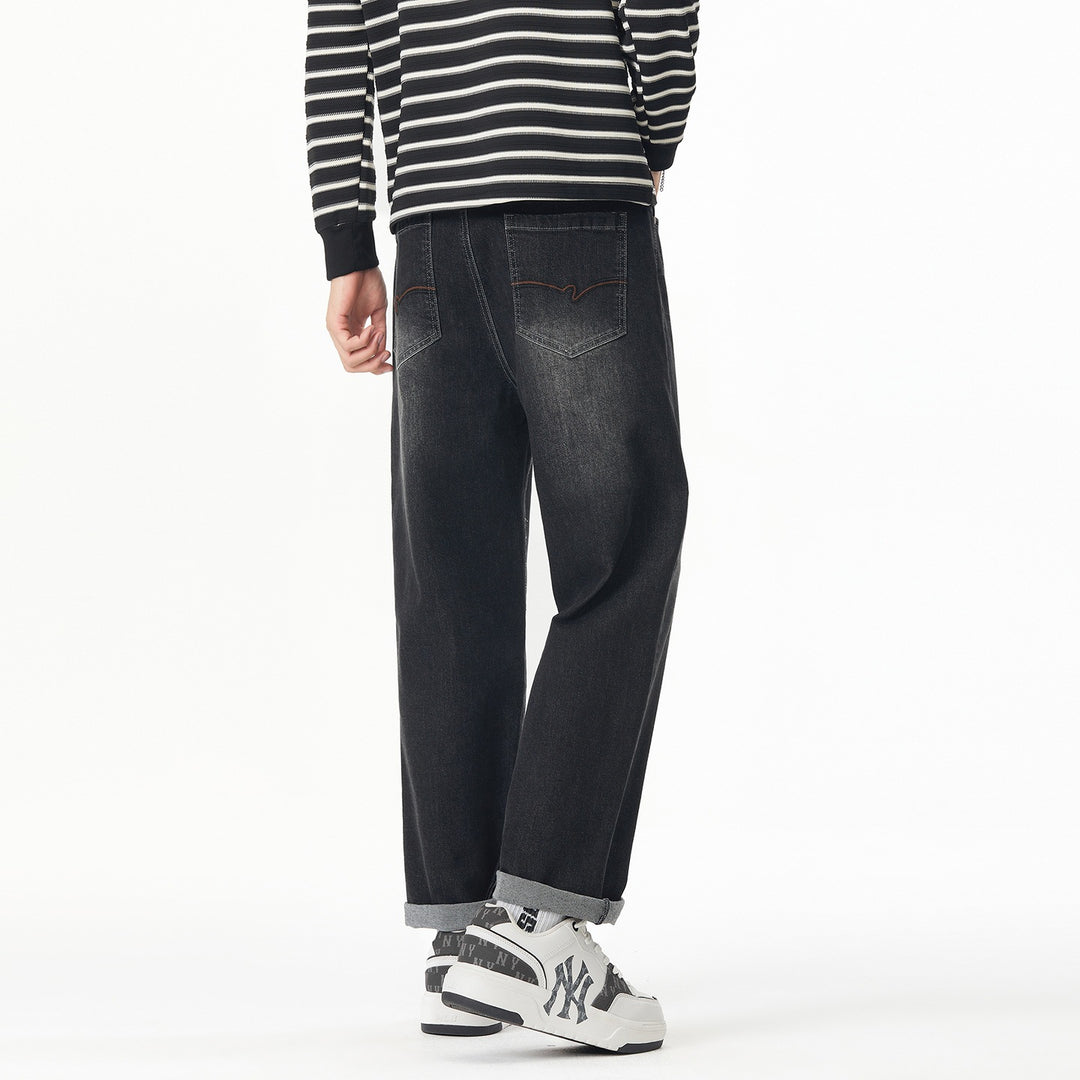 Herren Weite gerade geschnittene Denim-Jeans mit Used‑Wash und Umschlagbund Echoarchiv