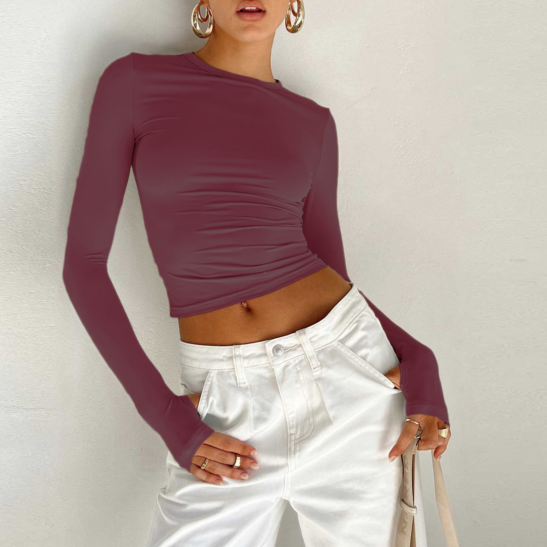 Damen Figurbetontes Crop-Longsleeve mit Daumenlöchern Echo Archiv
