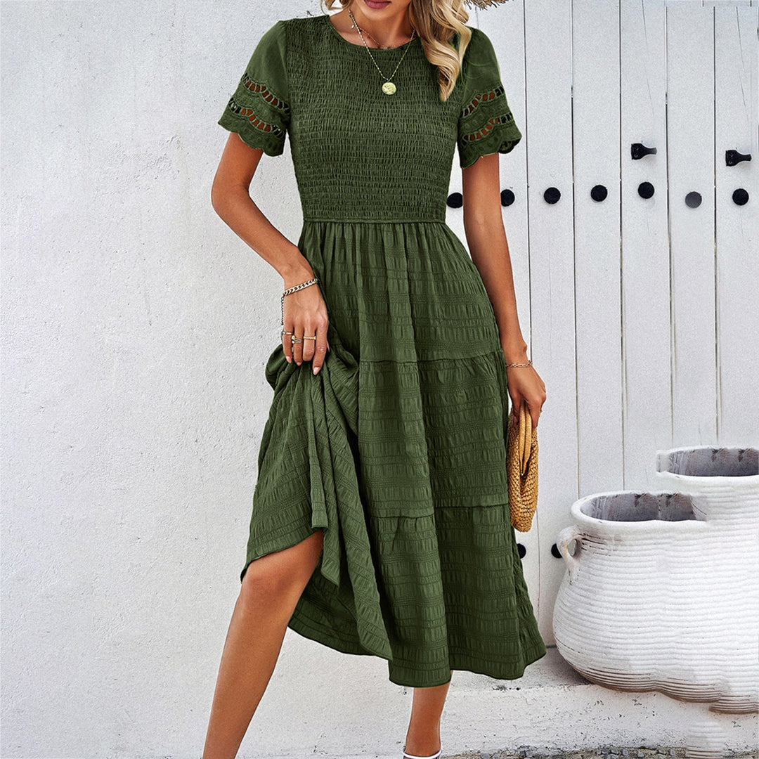Damen Midikleid mit Puffärmeln und Elastischem Oberteil Echoarchiv