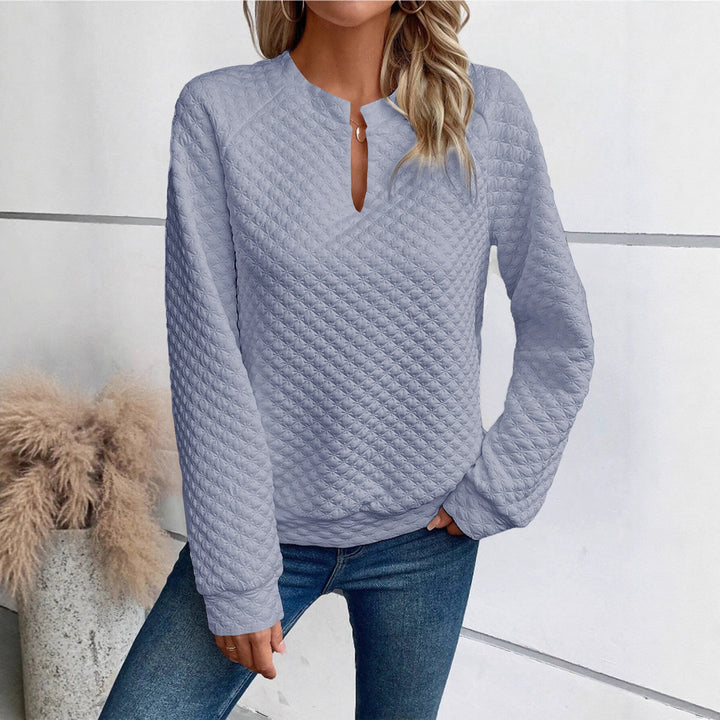 Damen Gestepptes Sweatshirt mit Schlitzkragen, Rautenstruktur und Raglanärmeln – Mavelle